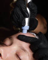 Client receiving a deep-cleansing hydro facial for glowing skin at Hyde Beauty & Wellness Spa near North Ogden, Utah